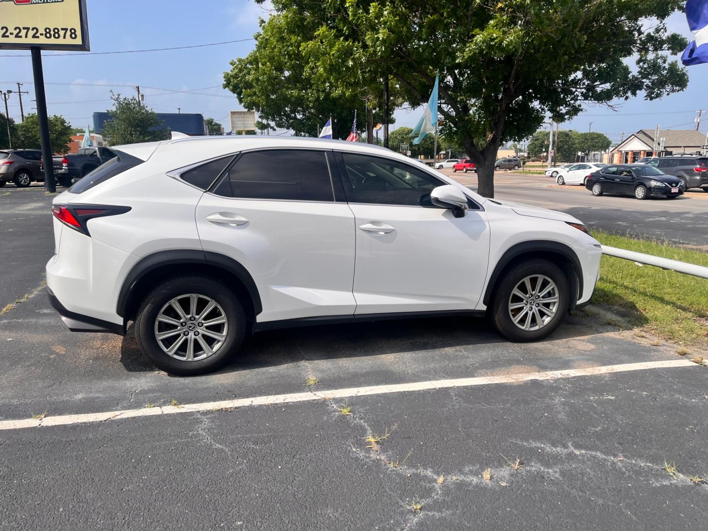 2019 white Lexus NX 200t (JTJBARBZ9K2) , located at 945 E. Jefferson Blvd, Dallas, TX, 75203, (214) 943-7777, 32.752514, -96.811630 - Photo#2